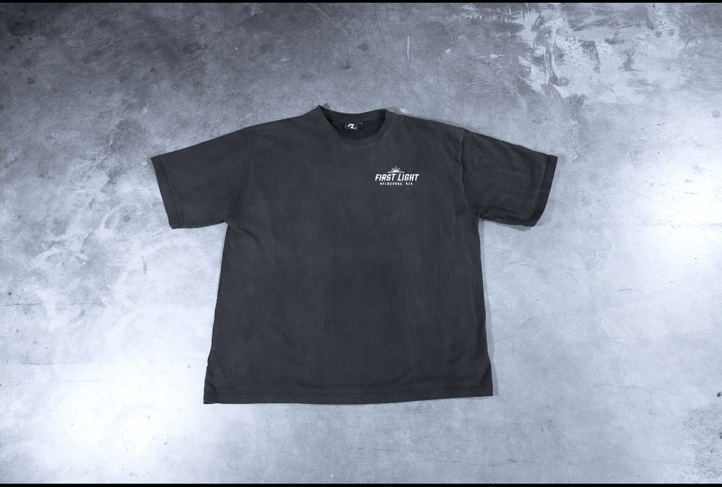 Front flat lay of the Dawn heavyweight tee in washed black, 250gsm acid-washed combed cotton