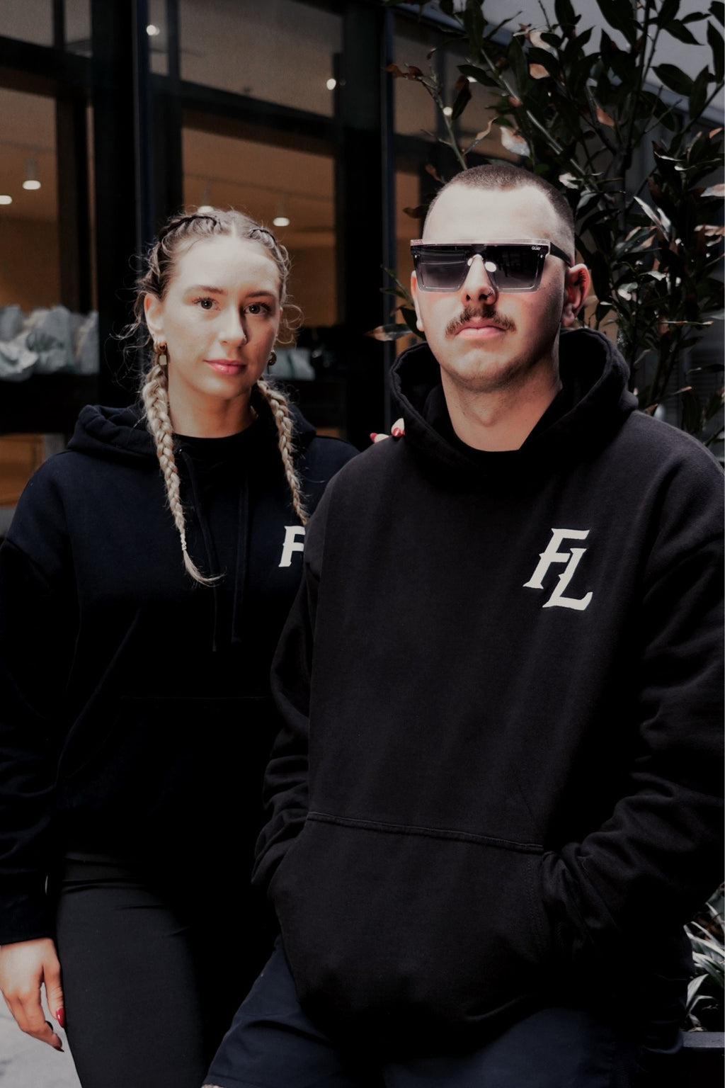 Two people wearing the Dawn heavyweight oversized hoodie, showing fit on different body types